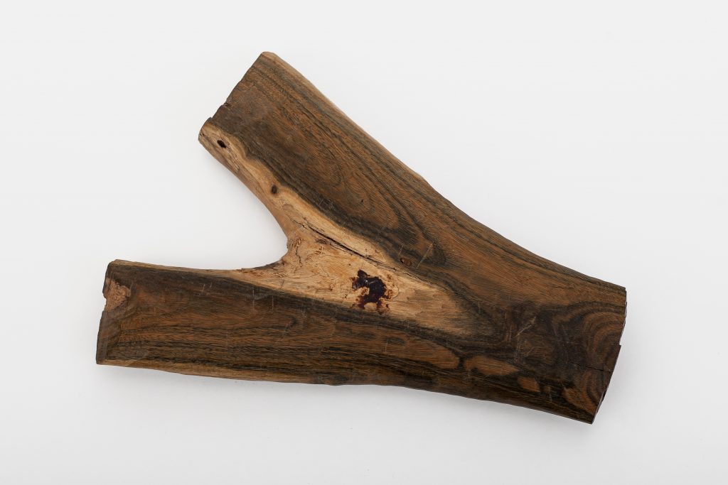 Wood carved into this shape to use for throwing in competitions.